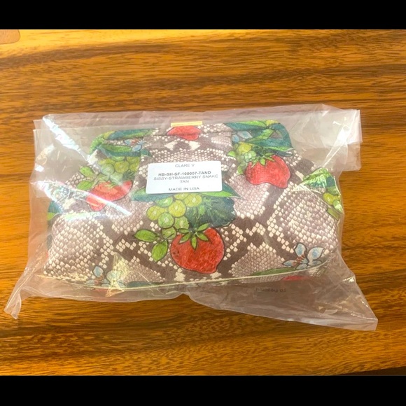 Clare v .Sissy print clutch